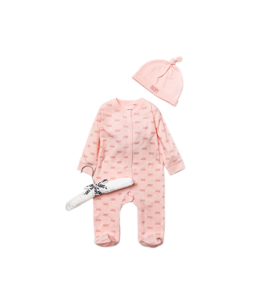 This adorable DKNY Jeans two-piece set includes a printed sleepsuit, and a matching hat with the DKNY Jeans logo. The set is cotton, with popper fastenings, keeping your little one comfortable. This set is packaged with a matching padded hanger making it the perfect gift for the little one in your life.