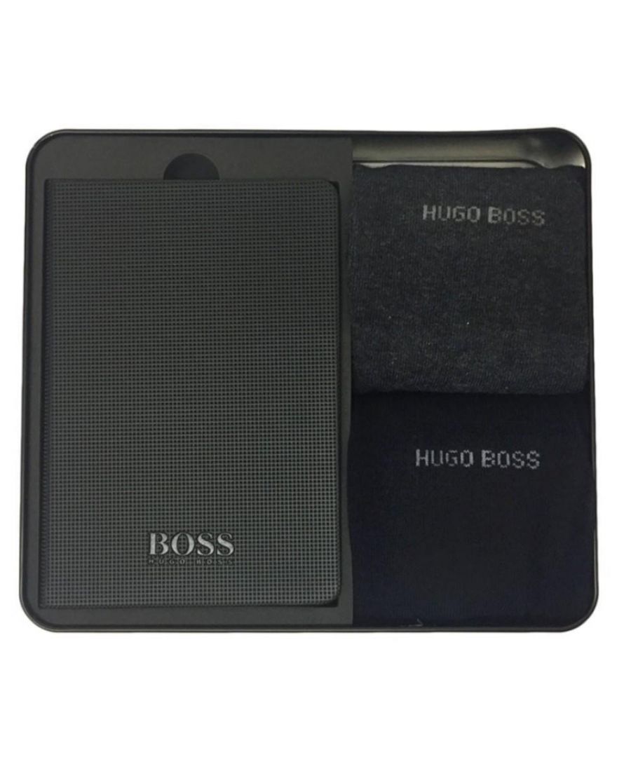 Hugo Boss Designer Crew Socks and Notebook Gift Set. Presented in a Black Tin. Featuring a Notebook white pages, and 2 Pairs of the Designer Socks. These Socks feature a Hugo Boss Logo, Pressure Free Comfort Band for Best Hold, Extra Reinforced Heel, Extra Reinforced Stress Zones, Pressure Free, Hand Linked Toe. UK 6-11, US 7-13, DE 40-46. Socks: 75% Cotton, 23% Polyamide, 2% Elastane, Book: 100% Paper