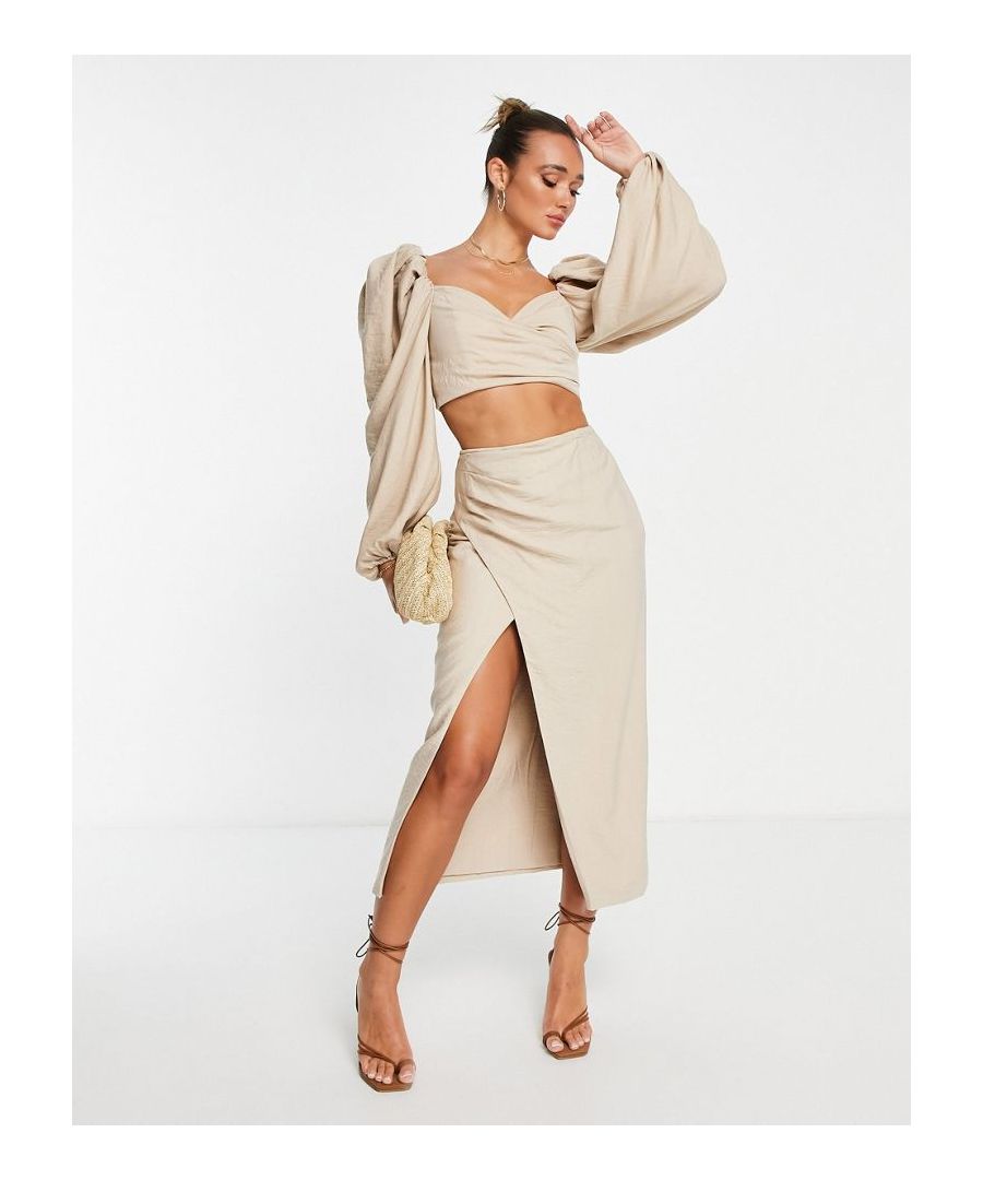 Skirts by ASOS EDITION Waist-down dressing High rise Zip-back fastening Wrap design Thigh split Regular fit  Sold By: Asos