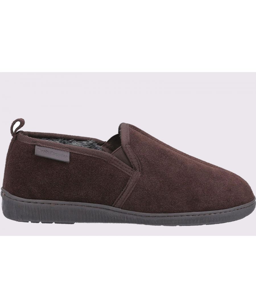 Mens Suede slippers from Hush Puppies - the Arnold. In classic slip on styling with cosy faux fur lining and sock keeps you comfy all day whilst the indoor/outdoor sole is flexible and hardwearing. Comes in a gift box for the perfect present\n-Real Suede Upper-Super Warm Lining\n-Memory Foam Comfort Insole.\n-Indoor and Outdoor Flexible and Hardwearing Unit