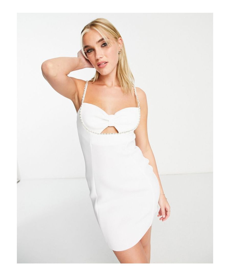 Mini dress by Miss Selfridge Love at first scroll Sweetheart neck Bow detail Faux-pearl embellishment Cami straps Slim fit Sold by Asos