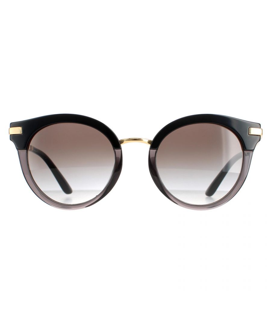 Dolce & Gabbana Round Womens Black Transparent Black Light Grey Black Gradient DG4394 Sunglasses are a modern round shape style with a thin metal bridge joining the premium acetate frame. The Dolce & Gabbana logo is embedded into the temples for a classy finish.
