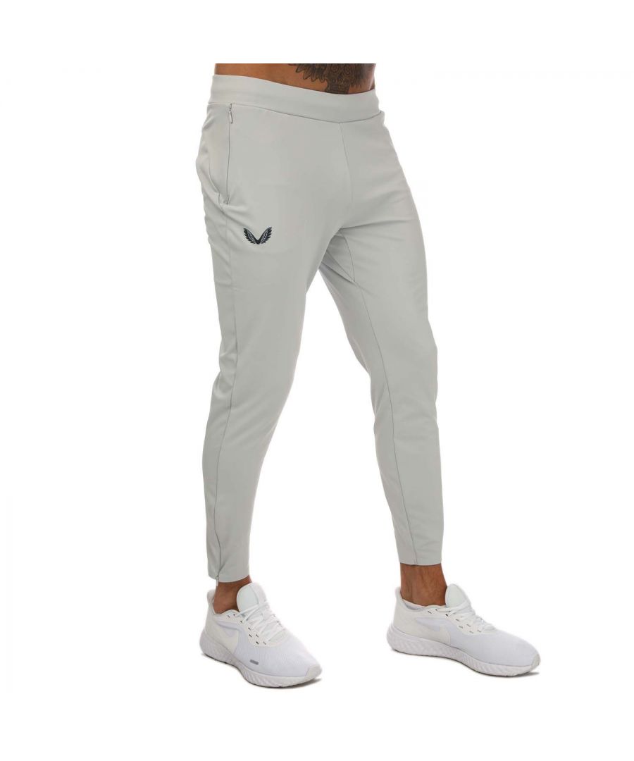 Mens Castore Active Stretch Jog Pants in blue.- Elasticated waistband and cuffs.- Concealed zip pockets.- Printed branding.- Quick Drying.- 87% Polyester  13% Elastane.- Ref: CM0329BLU