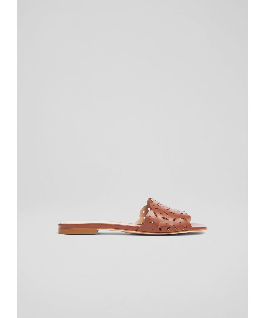 A chic take on a simple slider, our Amaya mules are a stylish push-on-and-go everyday sandal. Crafted in Spain from smooth calf leather in cognac-hued brown, they have a single wide strap over the foot embellished with a perforated pattern and a flat heel. Wear them with your favourite summer skirts and dresses when the sun shines.