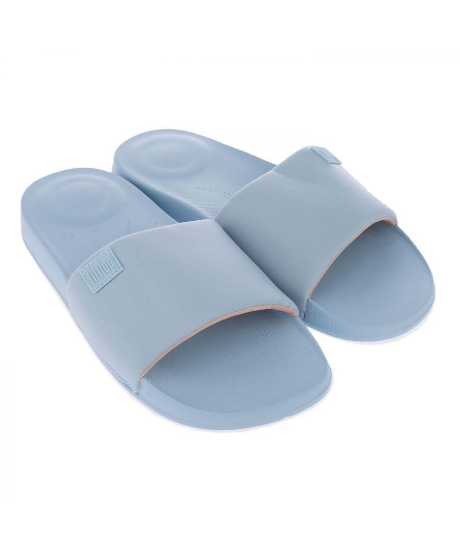 Womens Fit Flop iQushion Slide Sandals in light blue.- Synthetic upper.- Slip on closure.- Honeycomb pattern design.- Ultra-Lightweight  ergonomic Iqushion Midsole. - Flexible EVA sole.- Synthetic upper  Textile lining  Synthetic sole. - Ref: EB9896