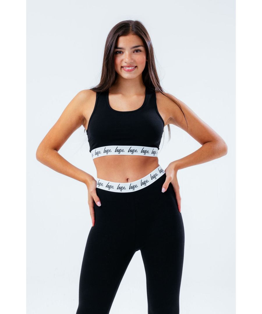 Introducing, the HYPE. Girls Bralet. Featuring a micro poly fabric for the ultimate comfort. Finished with a monochrome embossed woven elasticated waistband. Wear with a pair of black joggers and over-sized denim jacket for an off-duty casual look. Machine washable.