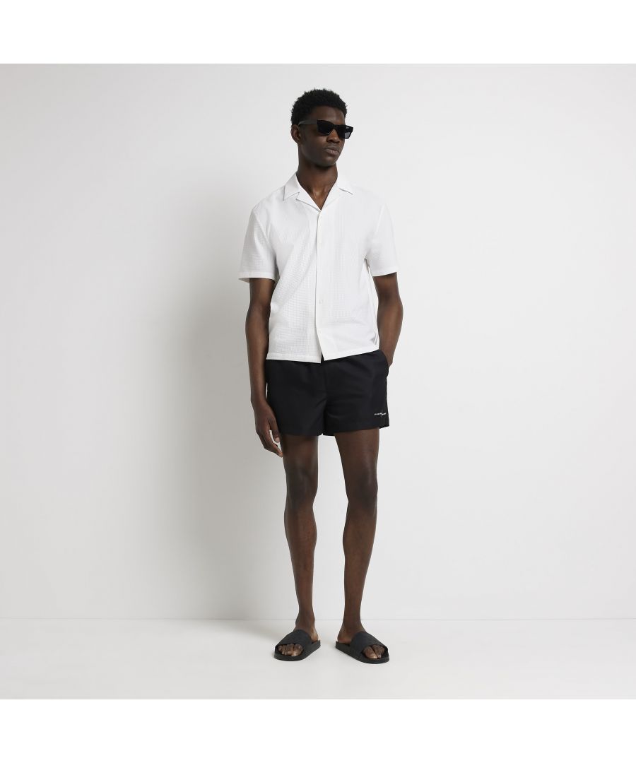 > Brand: River Island> Department: Men> Colour: Black> Material Composition: 100% Polyester> Type: Swim Bottom> Material: Polyester> Size Type: Regular> Pattern: No Pattern> Occasion: Casual> Season: SS22