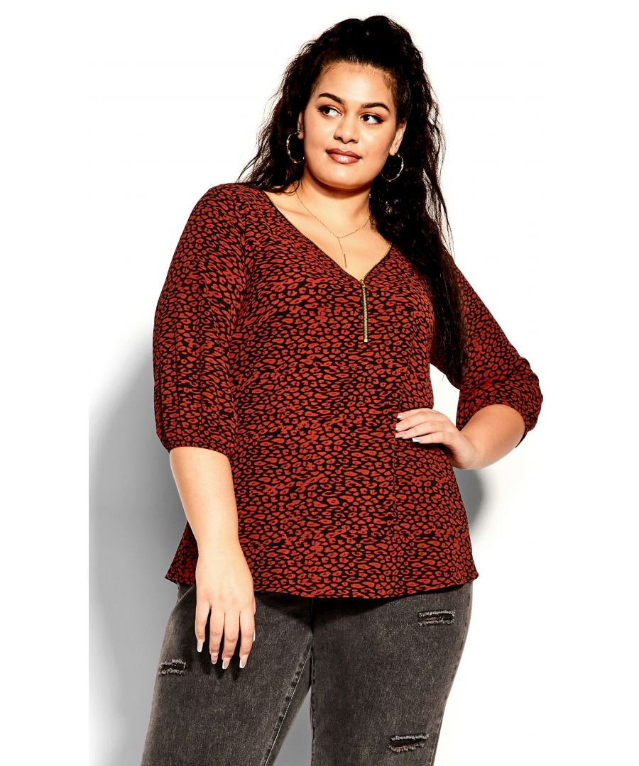 Add a splash of glamour to your staples with the Leopard Lust Top. Featuring a workable zip closure to the neckline, this top includes a relaxed silhouette and quarter-length sleeves for an effortless finish. Key Features Include: - Workable zip neckline - Darted bust - 3/4 sleeve with elastic cuff - Relaxed fit - Hip length hemline - Lightweight woven fabrication Style this top with a pair of mid wash denim jeans for a laid back look.