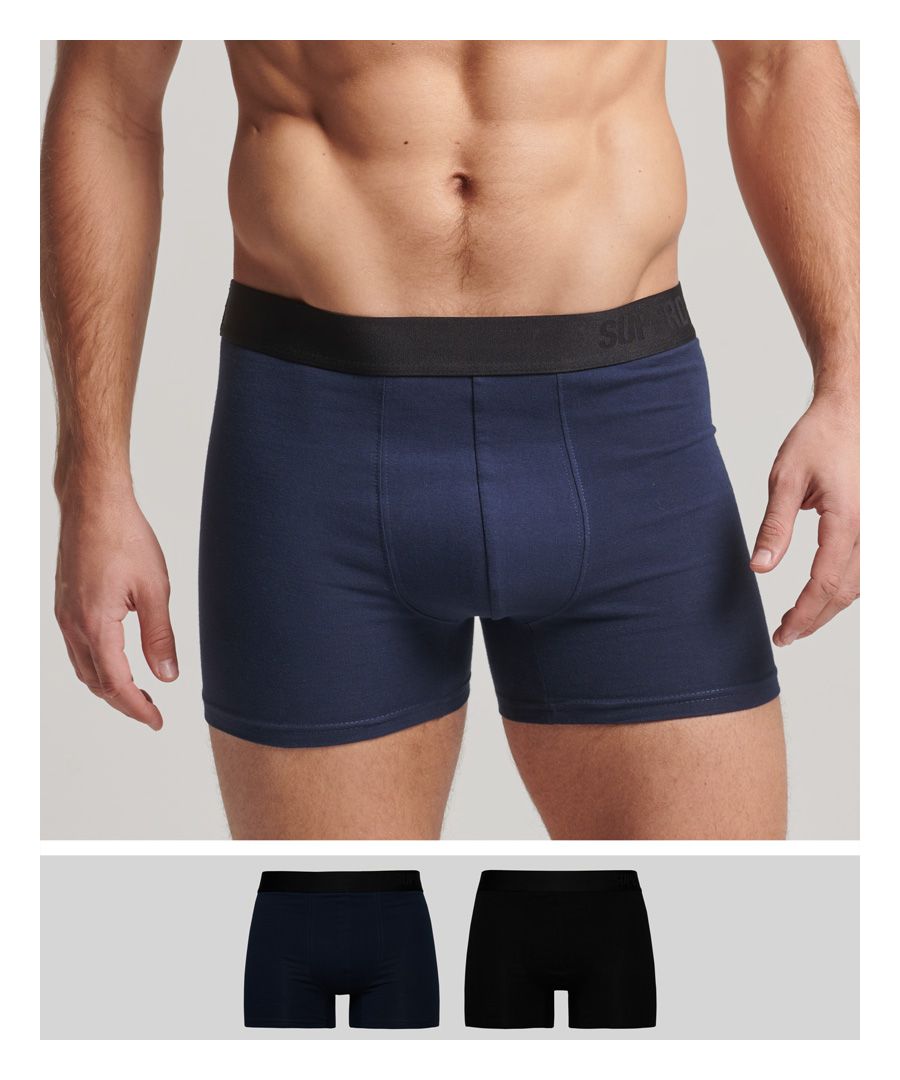 These classic Organic Cotton boxers feature an offset Superdry logo and subtle branded style. This pack of two doubles up on the premium softness, perfect for expanding your wardrobe basics.Elasticated waistbandMid-length design - 8cm inseamSignature logo detailing
