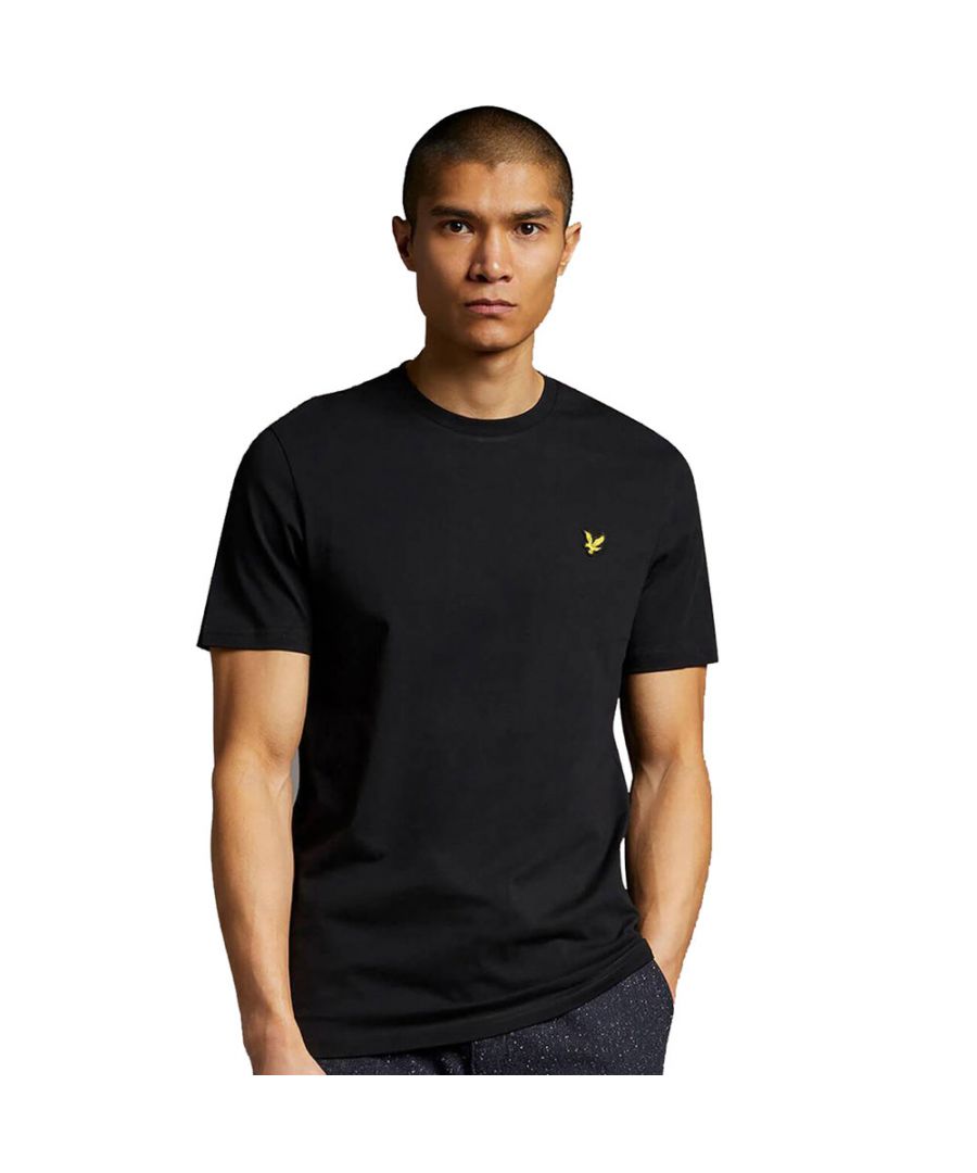 Crafted from 100% cotton from unrivalled softness, the Lyle & Scott Plain T-Shirt is an iconic style and the definition of a wardrobe staple. Featuring a classic silhouette, detail stitching at collar and cuff, plus our signature Golden Eagle, this t-shirt can be seamlessly layered or stand alone as the centrepiece of any smart-casual outfit.  \n  \nFit: Regular\nIt is crafted to fit the body neither too tightly or too loosely, leaving you with a classic, timelessly stylish look. We recommend you order your usual size, but if you're caught between two, go a size up.