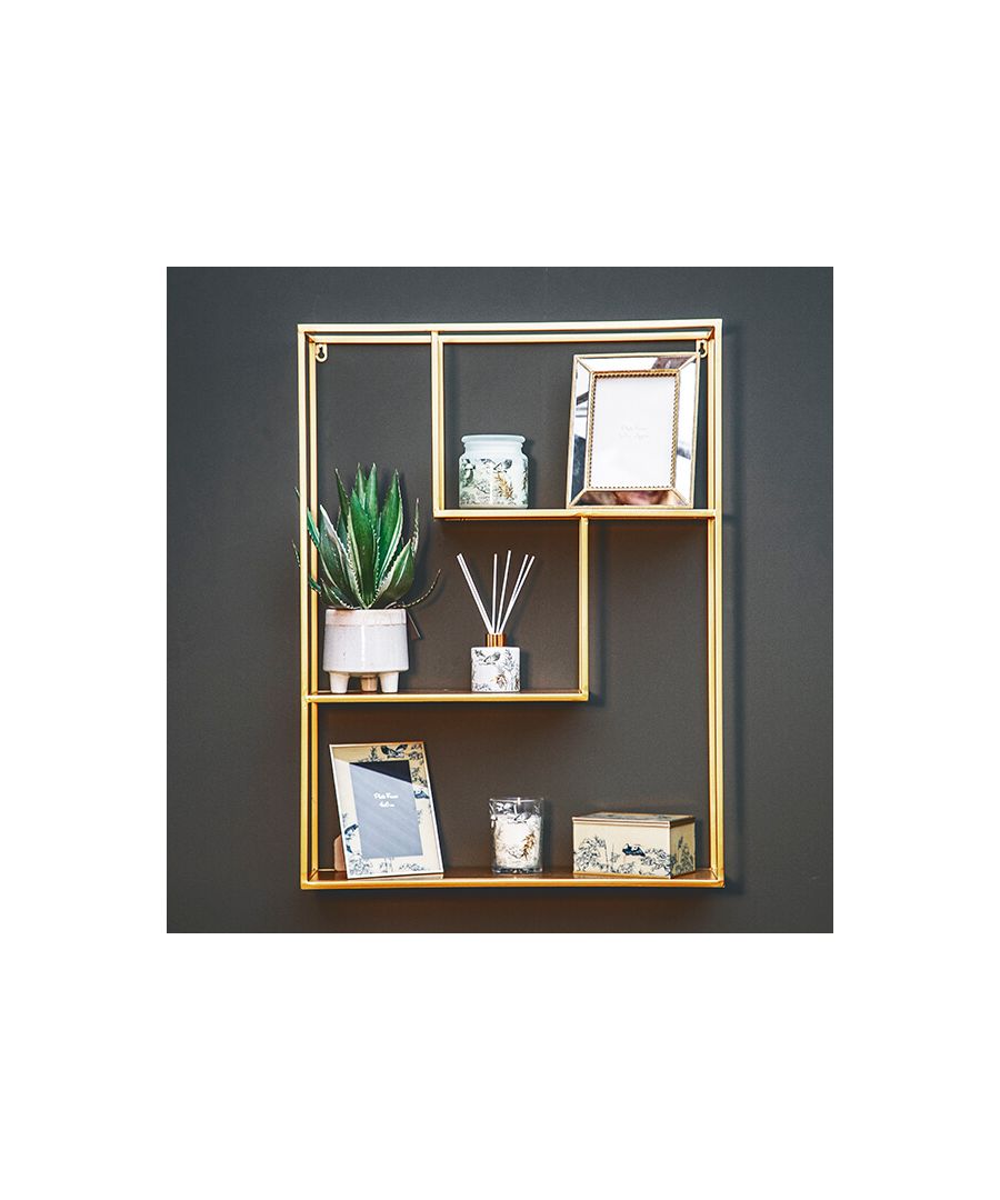 Present your photo frames, plants, candles and trinkets within this gold wall shelf, featuring three inventively staggered tiers, and add a touch of artful exuberance to your interior aesthetic.\n \nLooking to step up your interior design game? Look no further. This gold wall shelf unit combines geometric mastery with futuristic creativity. Clean and uncomplicated, this gold shelf unit can adorn both contemporary and classic interiors, delivering a soft touch of modernity. Make every feature a statement with this unit.\n \nFeatures: \n\n\nMetal wall shelf\n\n\nThree shelves\n\n\nMidnight Blush collection\n\n\n \nProduct specification: \n\n\nProduct Type: Wall Shelving Units\n\n\nWeight: 3.43kgs\n\n\nDimensions: H80 cm x W60.2cm x D17cm