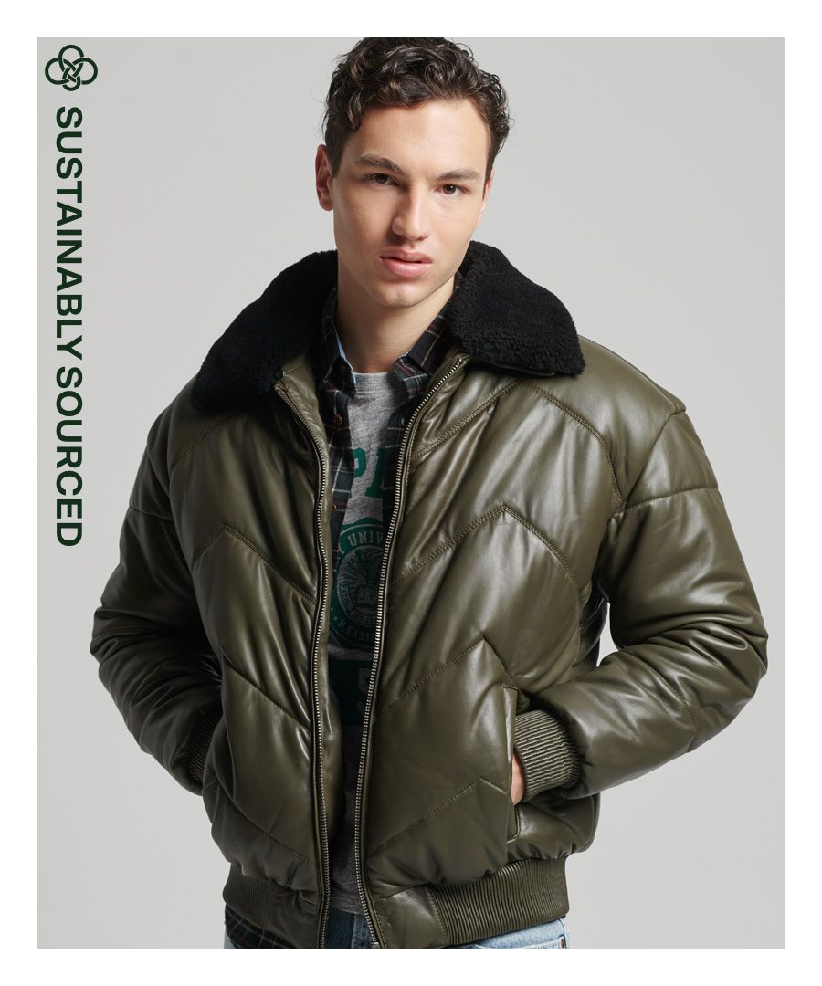 Look and feel great in the Heritage Leather puffer jacket. Made with 100% lambskin leather and a sheepskin fur trim, this is sure to become a firm favourite.Relaxed fit – the classic Superdry fit. Not too slim, not too loose, just right. Go for your normal size100% lambskin leather100% sheepskin fur trim that is removableRecycled polyester paddingZip fasteningThree pocket design including one inner pocketRibbed cuffs and hemSignature metal logo badgeThe padding in this jacket is 100% recycled, each jacket contains up to 30 recycled bottles, this avoids these bottles being sent to landfill or polluting our oceans.