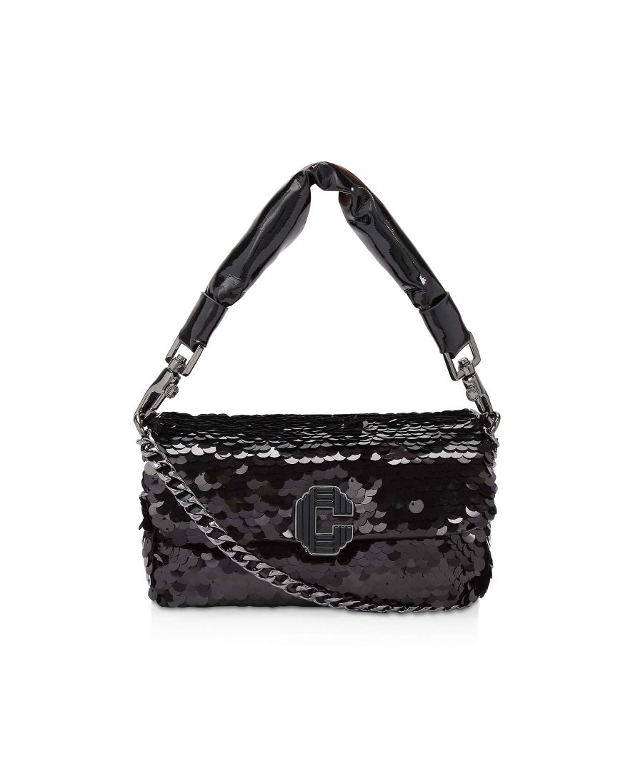 The Softy Mini is a cross body bag that is embellished in black sequins. The front flap is fastened with Signature C clasp. 10cm (H), 21cm (L), 4cm (D). Strap drop cross body: 115cm. Strap drop top handle: 38cm.