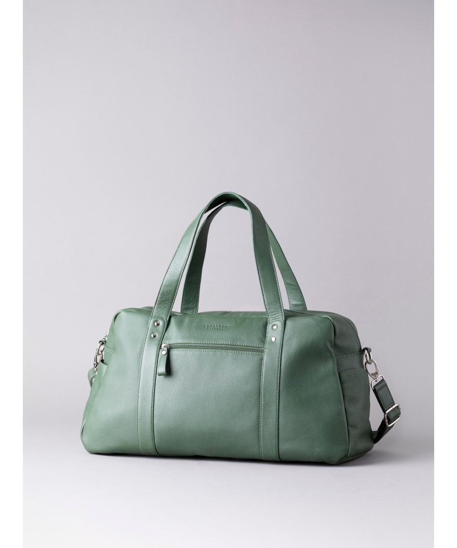 That long weekend away is calling! The Lorton large holdall is a spacious option crafted from luxury textured leather in stunning khaki green colourway, complete with shoulder straps and a longer, removable and adjustable cross body strap. The spacious interior of the holdall features a zip and slip pocket while the outside boasts side slip pockets and a front zip pocket for quick access essentials.