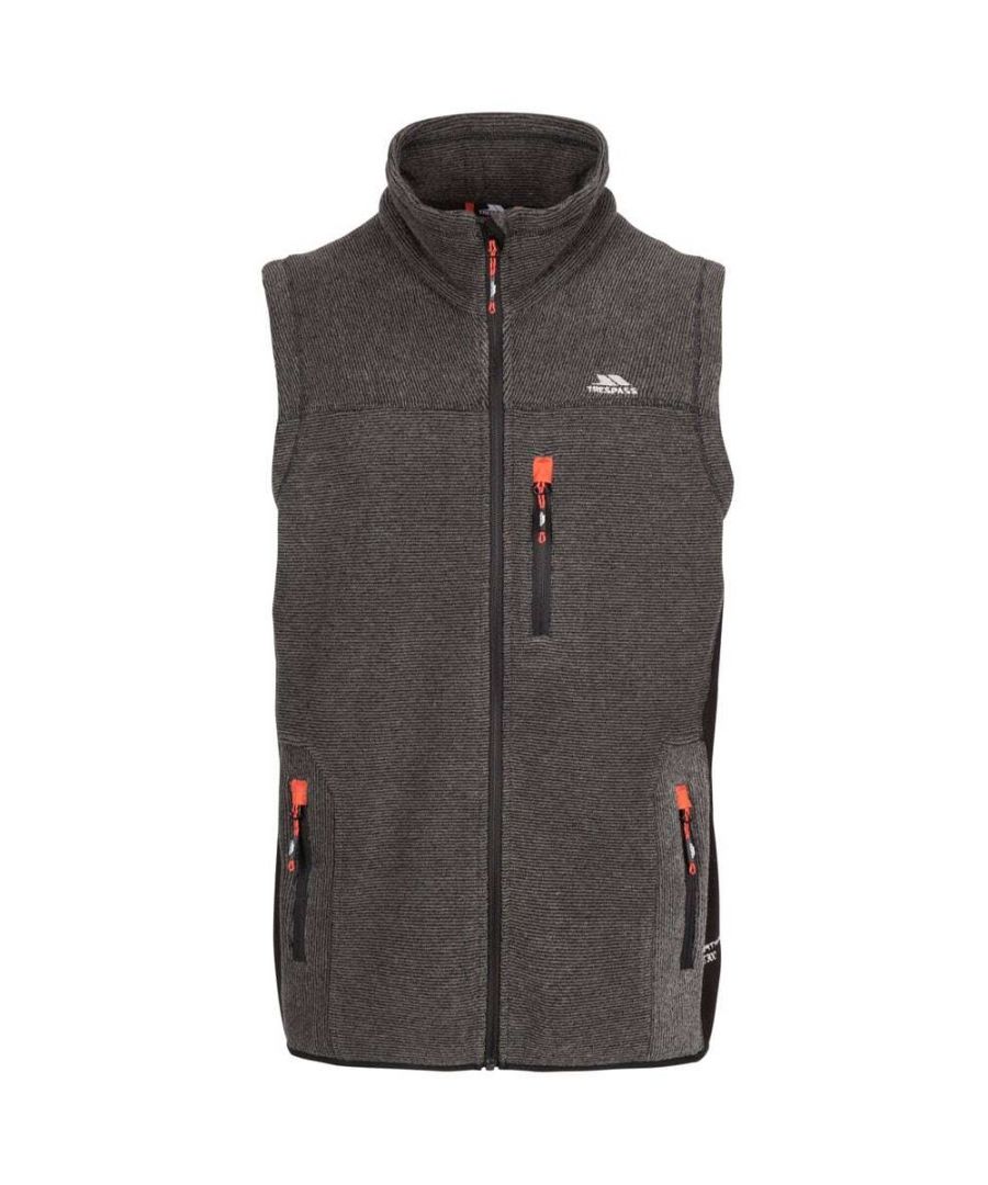 Material: 100% Polyester. Fabric: Knitted, Polar Fleece. 390gsm. Design: Ribbed Effect. Airtrap, Side Panels. Fabric Technology: AT300. Sleeve-Type: Sleeveless. Neckline: Standing Collar. Pockets: 1 Chest Pocket, 2 Side Pockets, Zip. Fastening: Full Zip. Hem: Stretch Binding.