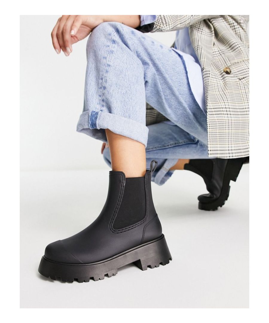 Wellies by ASOS DESIGN Next stop: checkout Pull tab for easy entry Elasticated inserts Round toe Chunky sole Lugged tread  Sold By: Asos