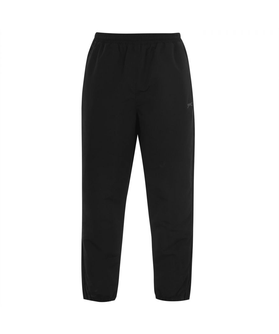 Slazenger Woven Track Pants - Train in comfort with these Men's Slazenger Woven Track Pants. The track pants offer a comfortable fit thanks to their elasticated waistband with an internal drawstring fastening. Internal mesh lining offers breathability for when your body warms up whilst training. The track pants feature zip fastenings to the ankles and two pockets to the sides for storing your belongings.  > Men's Track Pants > Zipped Hem > Elasticated Waistband > Inner Drawstring Fastening > Mesh Lining > Soft Fabrics > Regular Fit > 2 Zipped Pockets > Slazenger Branding > 100% Polyester > Machine Washable at 40 Degrees > Keep Away From Fire