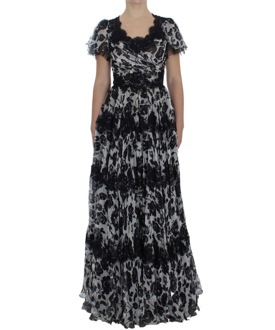 Dolce & ; Gabbana Gorgeous brand new with tags, 100% Authentic Dolce & ; Gabbana black and white floral print Silk lace and ricamo full length maxi dress Model : Full length short sleeve maxi dress Color : Black and white floral print Back zipper closure Logo details Made in Italy Very exclusive and high craftsmanship Material : 80% Silk, 16% Cotton, 4% Nylon Lining : 71% Nylon, 29% Cotton