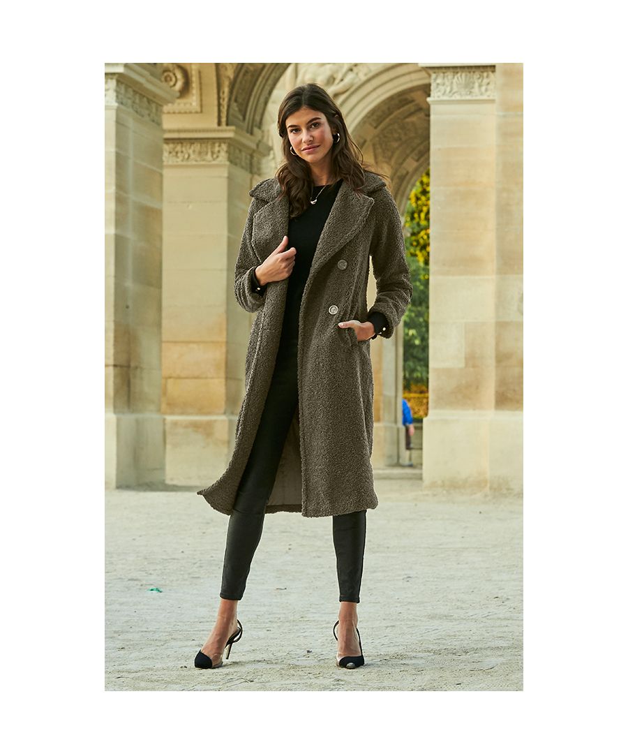 REASONS TO BUY:\n\nCosy never looked so good\nSnuggly borg fabric\nMidi length for maximum warmth\nButton front fastening\nCool oversized lapels\nYou'll wear it with everything