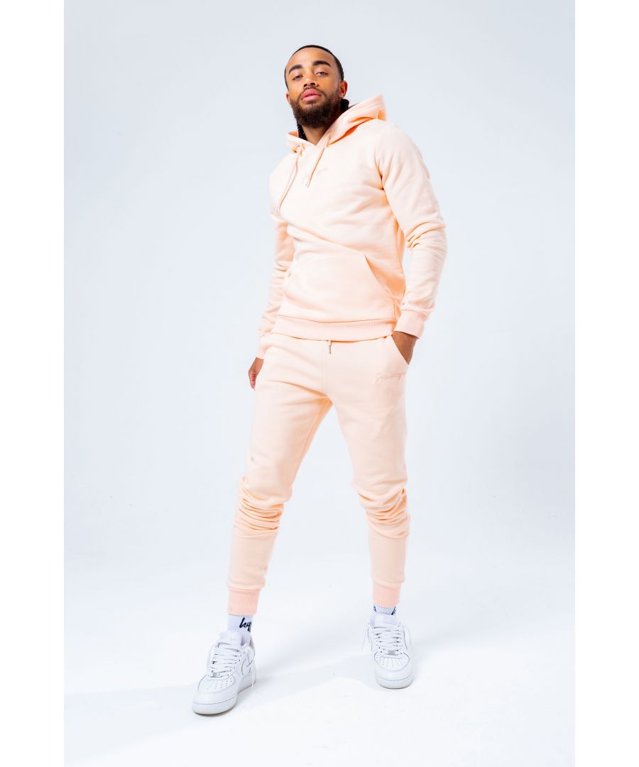 Introducing the freshest loungewear set you've ever seen! The Hype Eggshell Scribble Logo Men'S Hoodie & Jogger Set is your new go-to loungewear set when you need that extra comfort boost. Designed in 80% Cotton 20% Polyester for the ultimate soft touch feeling! The Hoodie features a fixed hood, kangaroo pocket, fitted hem and cuffs, finished with drawstring pullers and embossed justhype embroidery across the front in the same colour. The Joggers highlight an elasticated waistband, fitted cuffs and double pockets with tonal drawstring pullers and embossed justhype embroidery on the side of the leg. Wear together or stand alone with a pair of box fresh kicks. Machine washable. 