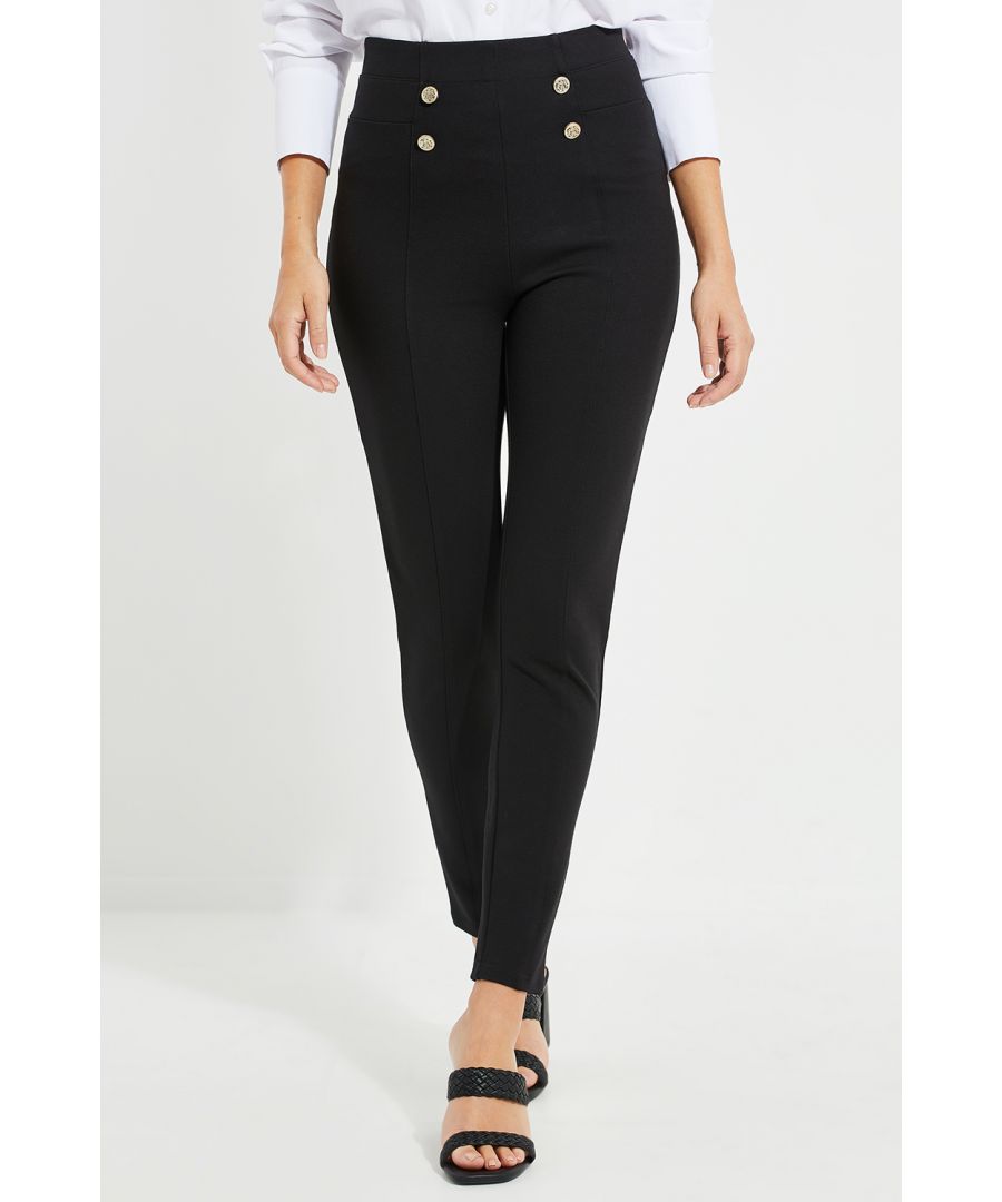 These tailored slim-fit trousers from Threadbare are perfect to take from day to night. The trousers feature an elasticated high waistband with military button details, seam details on the hips and down the legs. Pair with a crisp shirt for workwear chic, and pair with a colour-pop blazer for after work drinks. Other styles also available. Model Wears Size 8.