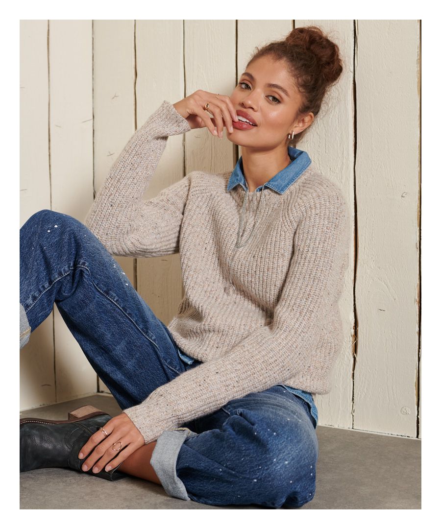 Those colder months are on their way so stock up on your winter cosies while you can. Wool-rich and drawing on the heritage of an outdoors lifestyle, this Tweed Ribbed Crew Neck Jumper will be the one you turn to for your unique and relaxed style when the weather takes a turn.Relaxed fit – the classic Superdry fit. Not too slim, not too loose, just right. Go for your normal sizeRibbed designCrew necklineSignature patch logoLambswool rich fabric