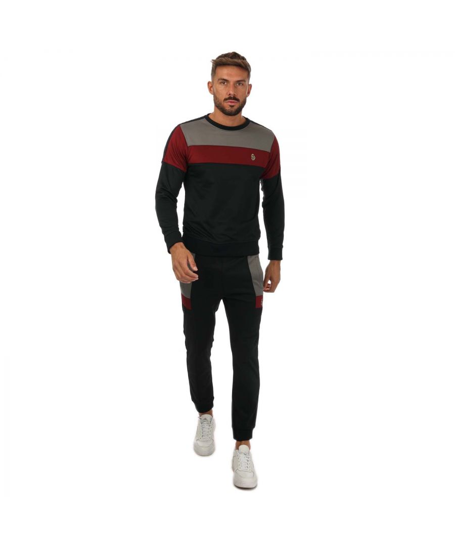 Mens Luke 1977 Loki Tracksuit in black. Sweatshirt:- Ribbed crew neck.- Long sleeves.- Ribbed cuffs and hem.- Brands iconic lion head embroidery.- 90% Polyester  10% Elastane.Pants: - Elasticated drawcord waist.- Two slip pockets.- Back zipped pocket.- Ribbed ankle cuffs.- 90% Polyester  10% Elastane.- Ref: M530306SETBLA