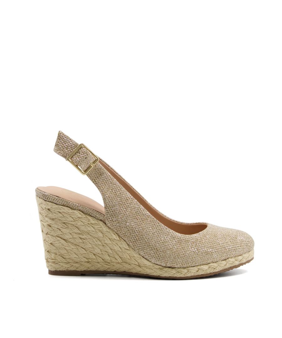 Reach new heights in these sling-back espadrilles. A holiday must-have, they rest on a woven raffia wedge heel. Comfortable and stylish, the adjustable strap ensures a perfect fit.