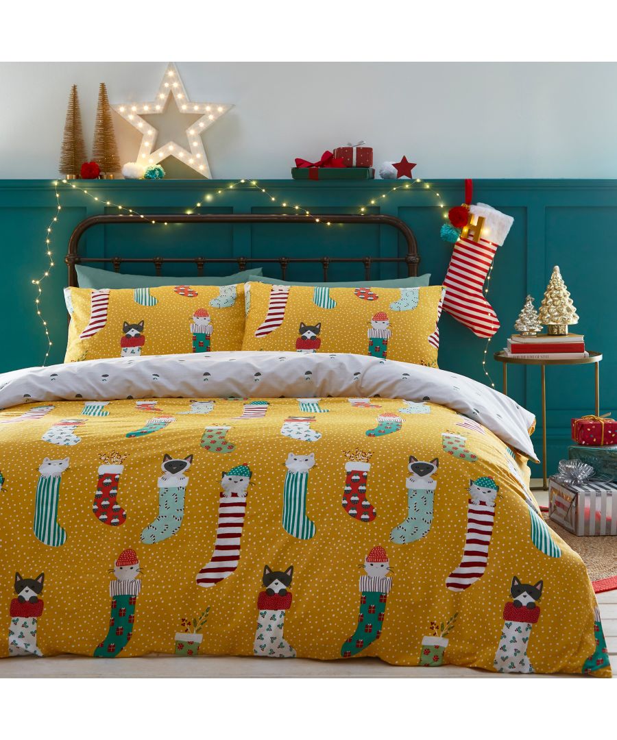 Add some personality to your Christmas décor with the meowy Christmas bedding, featuring adorable kittens inside vibrant Christmas stocking on an ochre polka dot base. The playful print continues to the reverse with a Christmas pudding design adding extra festive spirit to this duvet set. Includes 2 x pillowcases measuring 50 x 75cm.