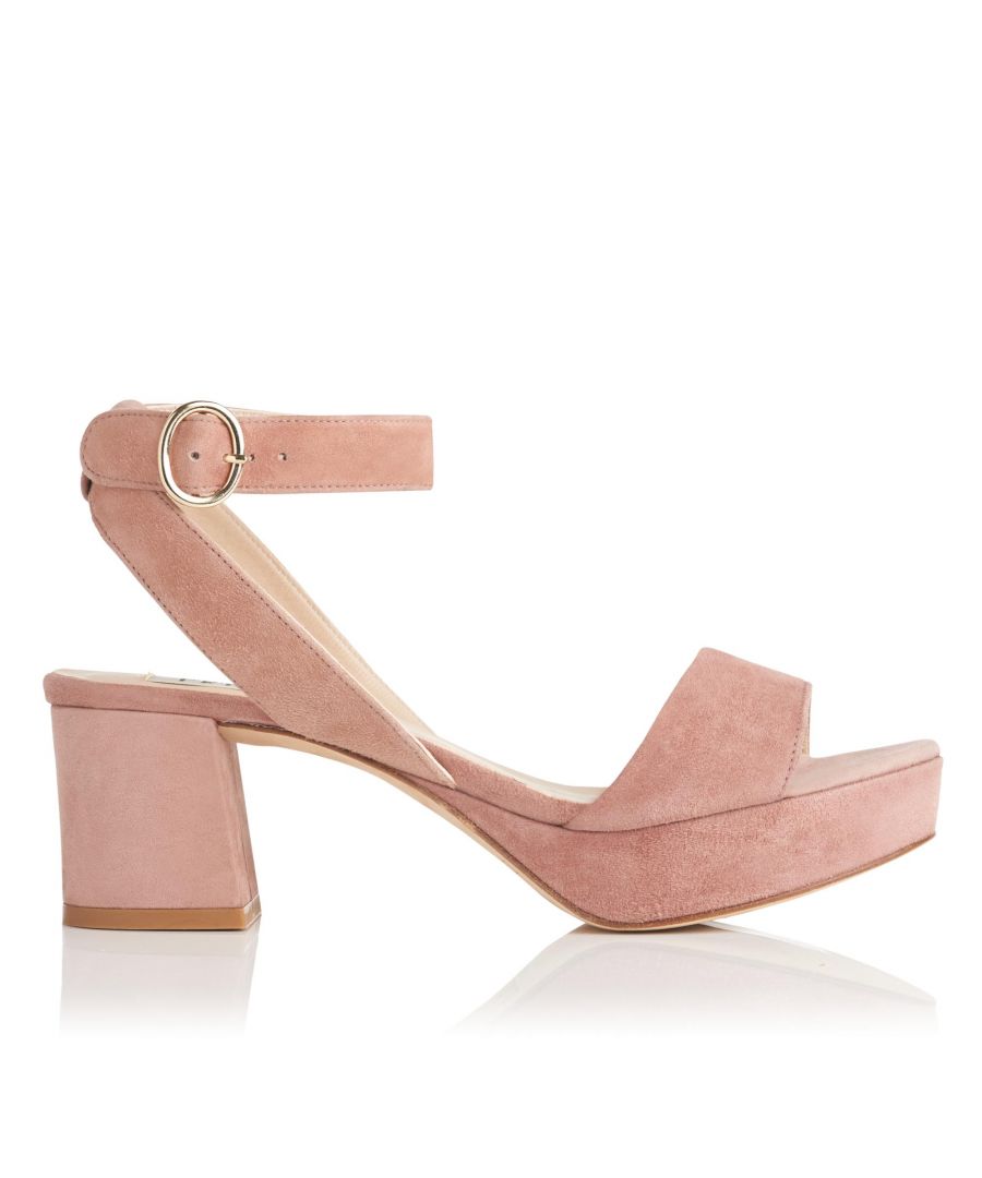 Searching for the perfect fusion of comfort and style? Meet Alie, our eye-catching platform sandals, thoughtfully crafted with a practical mid heel and designed in a versatile (yet luxurious) soft powder pink suede. A must on special occasions or on relaxed days with denim.
