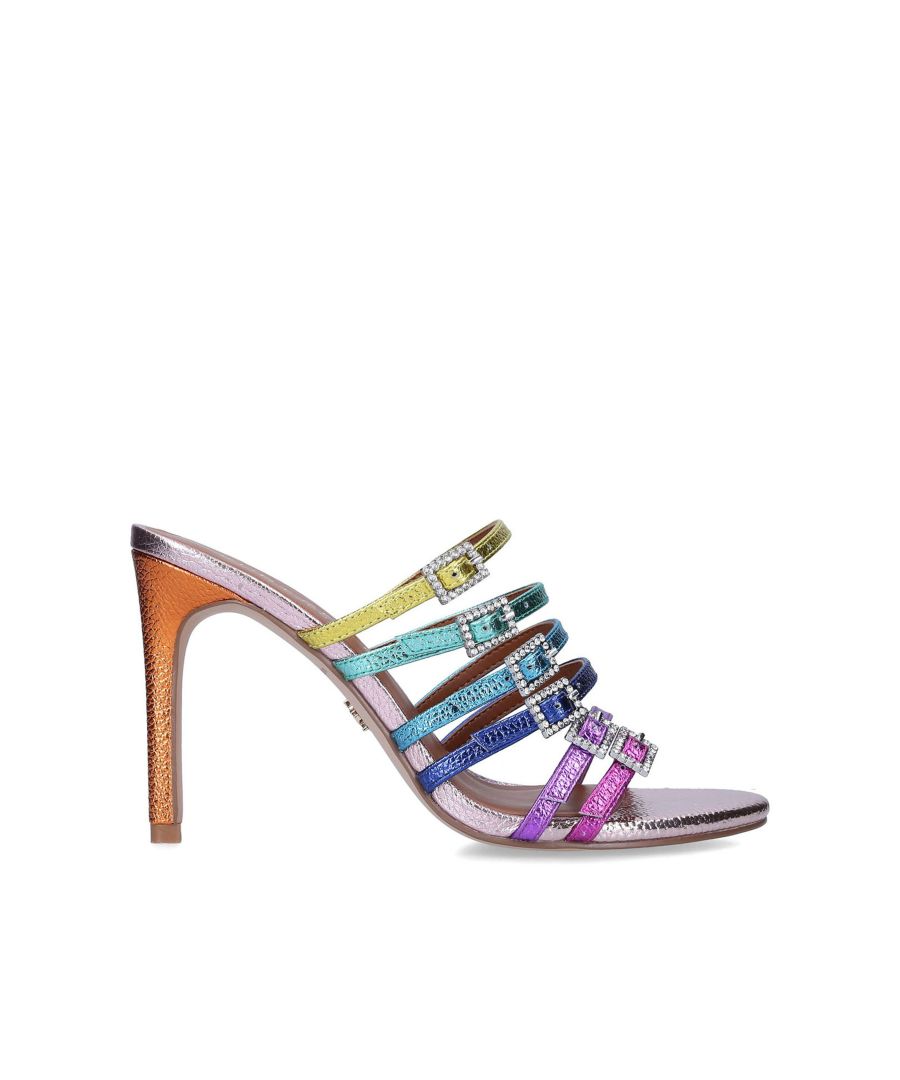The Pierra Mule is crafted from a textured leather in multiple metallic colours across the straps. Each strap is finished with silver jewelled buckle. Heel height: 9.5cm. Gold KGL stud on the outer sole.