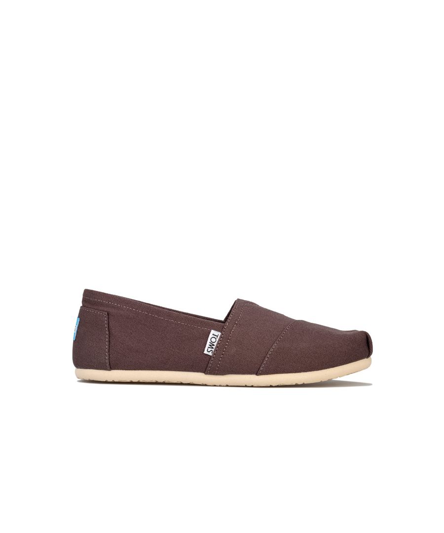 Womens Toms Classics Canvas Pumps in ash.<BR><BR>- Classic canvas slip on shoe.<BR>- Elasticated V insert to the front for additional comfort.<BR>- Contrast patterned lining.<BR>- Branding to the side and heel.<BR>- Cushioning suede insole.<BR>- Toe-stich.<BR>- Textile upper. Textile and leather lining. Textile and rubber outsole.<BR>- Ref: 10000871
