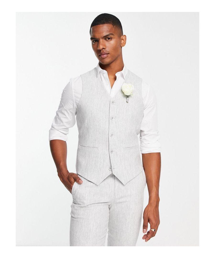 Suits by ASOS DESIGN Do the smart thing V-neck Button placket Pocket details Contrast back with an adjustable cinch Skinny fit  Sold By: Asos