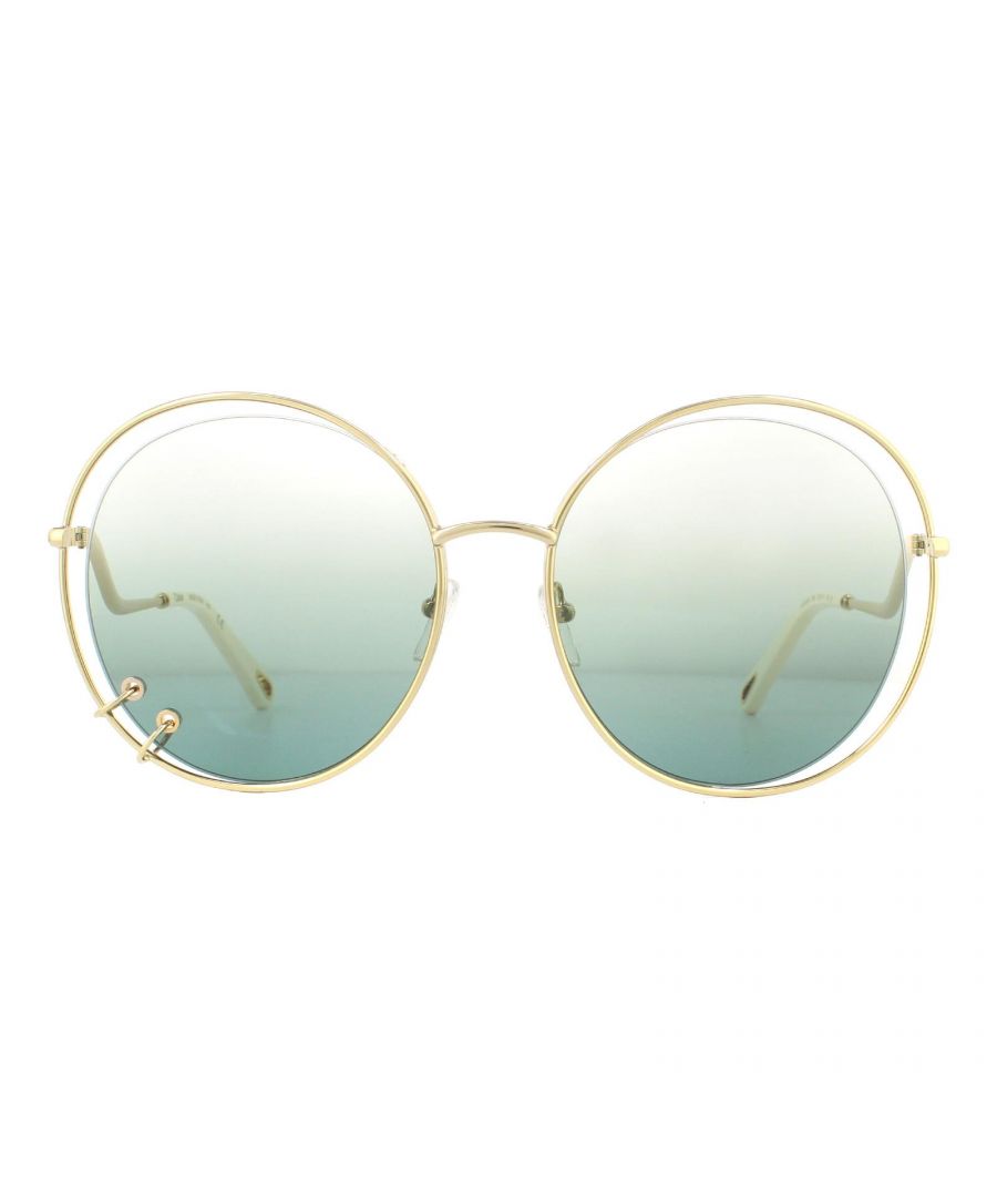 Chloe Sunglasses CE153S 838 Gold Petrol Blue Reverse Gradient are a unique and luxurious design with decorative rings piercing the lenses, sculptural metal wire frame and distinctive curved temples etched with the Chloe logo.