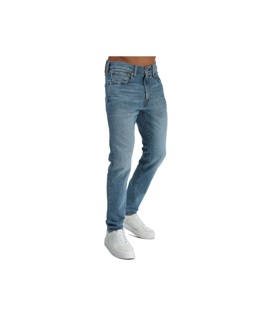 Mens Levis Slim Taper 512 Slim Taper Jeans in denim.- Classic 5 pocket styling.- Zip fly and button fastening.- Belt loops.- Slim fit through the thigh that tapers down to the ankle.- Stretch.- Levis branded waist patch.- Iconic Levis tab to the rear pocket.- Tapered leg.- 68% Cotton  31% Polyester  1% Elatane. Machine wash at 30 degrees.- Ref: 288331003