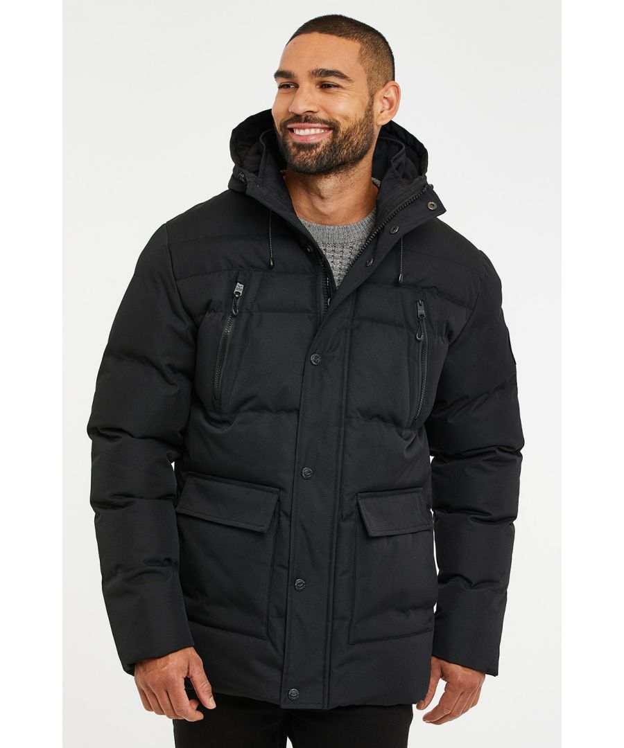 This hooded, puffer style jacket by Threadbare features a snap button storm guard over the zip and comes with two deep front pockets along with two zip up chest pockets. This style has a bungee adjusted, microfleece lined hood for extra comfort and features the classic threadbare badge on the sleeve.
