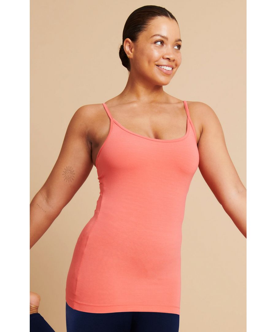 A great new style and the perfect summer essential. Great for layering or on its own. The extra-long length gives good coverage and won't ride up. The adjustable straps and internal bra provides light support. \n\nDesigned for Yoga and Pilates \nMade with 95% Bamboo Viscose, 5% Elastane\nOeko-Tex certified no nasties in the dyeing process\nFrom sustainably managed forests\nNaturally sweat-wicking and breathable\nUnrivalled softness and great for sensitive skin\nSuper soft\nScoop vest top\nInternal bra support\nAdjustable straps \nOffers light support\n\nGreat for all sporting activities