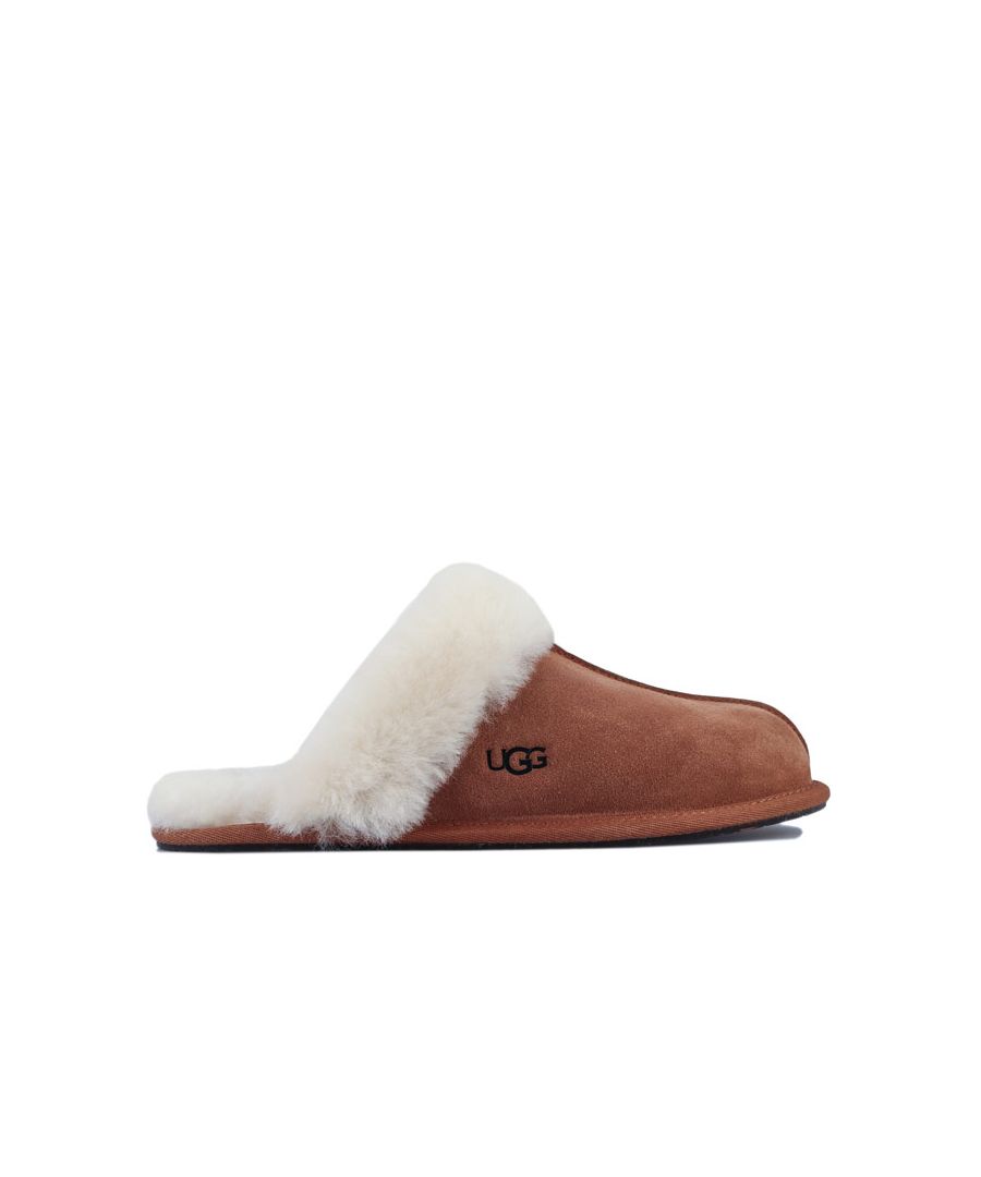 Womens UGG Australia Scuffette II Slippers in chestnut.<BR><BR>- Sheepskin and suede upper.<BR>- Slip-on construction.<BR>- Plush sheepskin lining and collar.<BR>- Moulded rubber outsole.<BR>- UGG Australia branding to side.<BR>- Suede and sheepskin upper  Sheepskin lining  Synthetic sole.<BR>- Ref: 1106872<BR><BR>We sell genuine UGG® products.  These are only available in half sizes.  Therefore if you were to order a size 5 we shall send you a 5.5 which we know from experience will be the best fit.