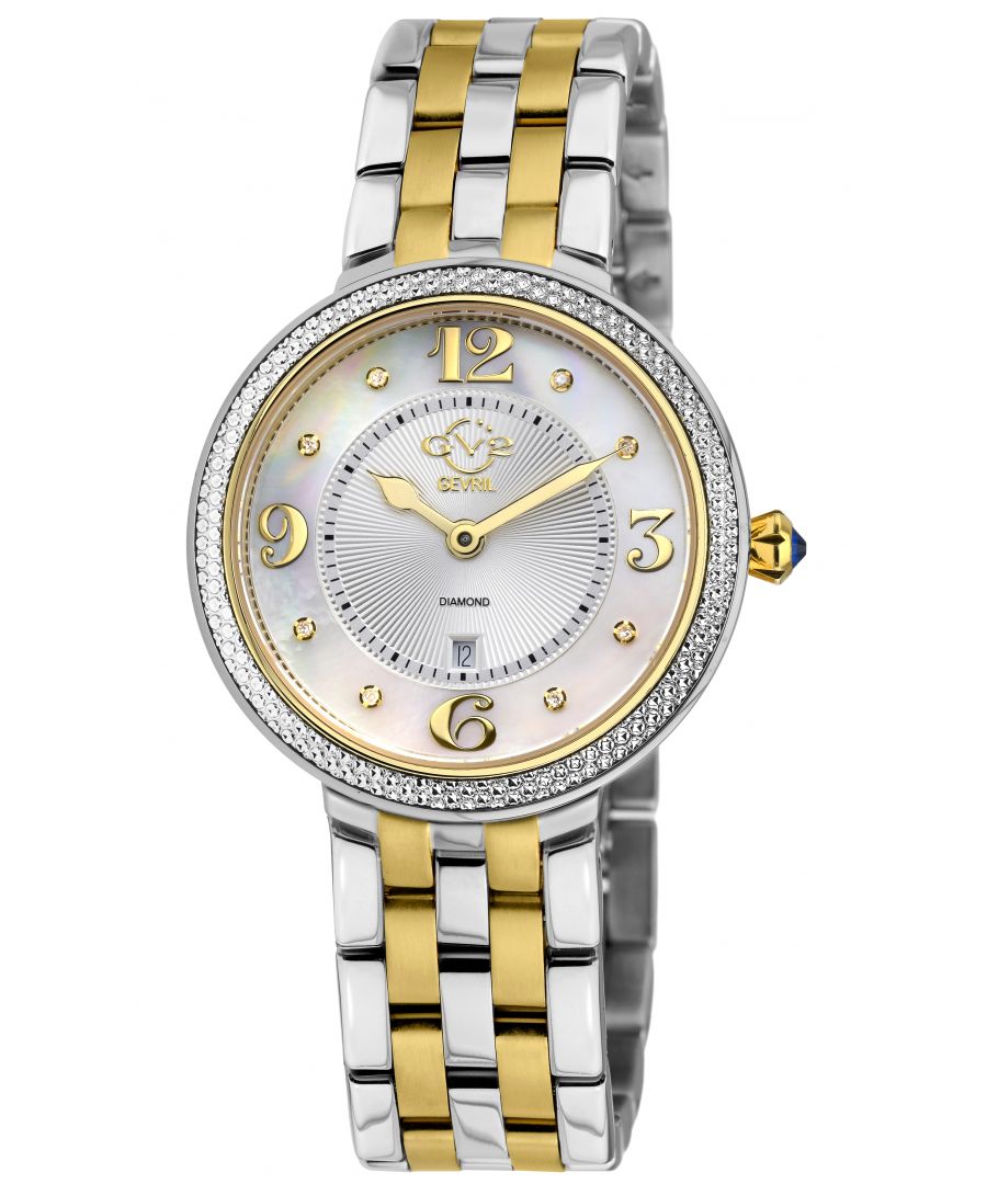 Crafted of a long, rich history and dazzling with its subtle charm, GV2’s Verona Collection is the best of what a women’s watch can be. A soft, powerful touch that delights the eye, the Verona Collection is for the romantic inside all of us.  Like the quaint town in Northern Italy, Verona timepieces stand the test of time using Swiss Quartz Movement. Brilliantly radiant while understated and restrained, the elegant design features curly, script numbering on the 3,6,9 and 12 markers adding soft touches over powerful fabrication. The 37mm diamond cut bezel contains a mother of pearl face with 8 stunning diamonds on the dial protected by anti-reflective sapphire crystal completing a design that would inspire Shakespeare.  In fair Verona, while romance leads, the construction harkens to an ancient past that is decidedly modern. Adorned with a push pull fluted crown in blue Cabochon stone, a nod to the city by the river, each Verona watch is secured with a braided bracelet and deployment buckle befitting ancient Roman ruins and stunning Medieval Architecture.  Whether strolling through the piazza, taking in an opera at the amphitheater or sightseeing through the mini coliseum, GV2’s fair Verona Collection inspires love at first sight.\n\nGV2 12903B Women's Verona Swiss Diamond Watch\n\nGV2 Women's Swiss Quartz Watch from the Verona Collection\n37mm Two toned SS/IPYG Diamond Cut Bezel Case\n8 Diamonds on White MOP Dial, Gold Indices\nPush Pull Fluted Crown with Blue Cabochon Stone\nTwo-Toned SS IP Yellow Gold Bracelet with Deployment Buckle\nAnti-reflective Sapphire Crystal\nWater Resistant to 50 Meters/5ATM\nSwiss Quartz Movement Ronda 784
