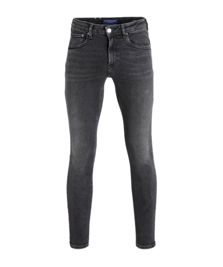 Deze skinny fit jeans voor heren van Scotch & Soda is gemaakt van stretchdenim. Het 5-pocket model heeft een rits- en knoopsluiting.details van deze jeans:stijlnaam: Skim5-pocket
