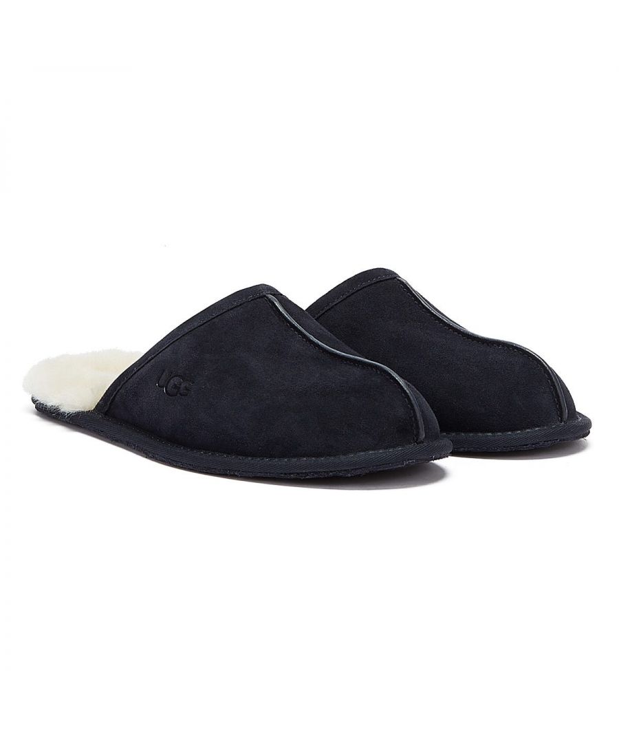 The Scuff from UGG Australia is a slipper meant to be worn indoors. Comes in a suede upper and a wool interior. The outsole combines suede and rubber. Complete with signature branding.\n\n- UGGpure™ wool lining and insole\n- Sheepskin insole\n- True to size but the size shown on a box may differ by a half unit due to new standards