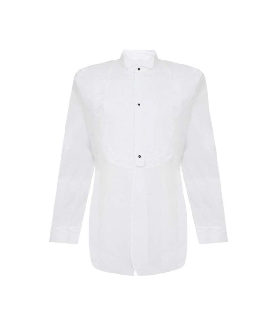 This Maison Margiela Tuxedo Shirt is crafted from 100% cotton and is in a white colour-way. This Shirt consists of long sleeves, buttoned cuffs, round neck, panel on front, side splits, shorter at the front, buttoned fastening and slim fitting.
