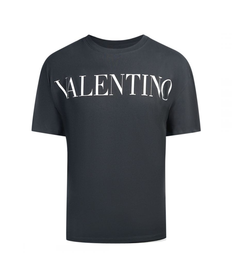 Valentino Large Branded Logo Black T-Shirt. This Valentino T-Shirt features Large Branded logo, printed on a comfortable cotton-blend short-sleeved tee. Perfect for casual wear or everyday occasions.. Regular Fit Style, Fits True To Size, Valentino Black Tee. 100% Cotton, Black tee With Short Sleeves. Valentino Design On Front, Crew Neck. WVOMG10W7SS 0NI