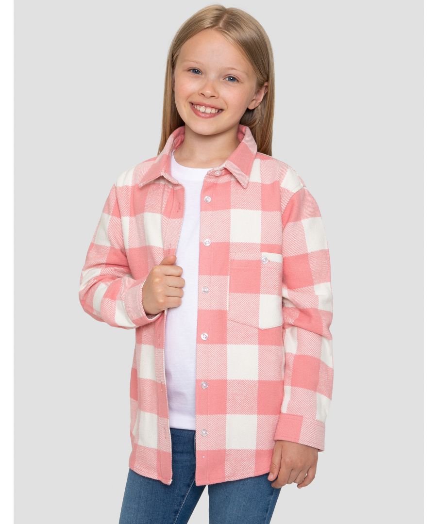 This button down long sleeve shirt from Threadgirls features a chest pocket and button fastening sleeve cuffs. Perfect for layering this season.