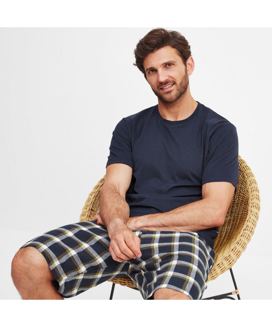 Supersoft and designed for maximum comfort, our Laze Mens Jersey Short Pyjama Set is perfect for lounging and sleeping. Contrast colours and textures mix things up a little with a solid-colour jersey tee and check pattern brushed flannel shorts. Laze has a relaxed fit enhanced by the wide crew neck and loose-fitting shorts with drawcord waist - clever details which all pump up the easy-to-wear, comfort factor. Laze comes in a check flannel bag, so also makes a great gift idea. The finishing touch is a small woven TOG24 label on the chest pocket and bag.