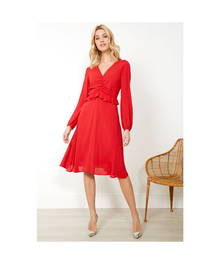 REASONS TO BUY: Wardrobe essential: the little red dressSexy, feminine and chicV-neck, ruched front, ruffle waist: it's made to flatterFluid hemline hangs beautifullyFor date night drinks and dancing at weddingsAdd court shoes or strappy sandals