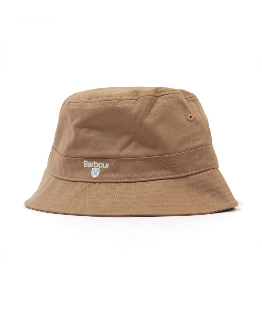 The timeless bucket hat has been given the Barbour Treatment this season. Crafted from their signature cotton, featuring a thick sloping brim. tonal stitching, shaped seams to the crown and a tartan lining. Finished with subtle Barbour branding.\nPure Cotton, Tartan Cotton Lining , Thick Sloping Brim, Tonal Stitching, Barbour Branding.
