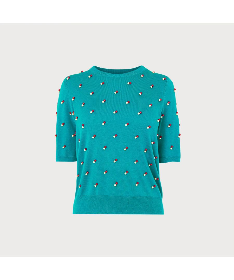 Pretty in pearls, our Sarah knitted top is inspired by beautiful vintage designs. Crafted from a luxurious silk-cotton blend in teal blue, this eye-catching knit has a round neck, short sleeves and a regular fit, and is embellished with cream and dusky pink pearls. Wear it with tailored trousers or play to its dressy side by pairing with our Fifties-style full skirt.