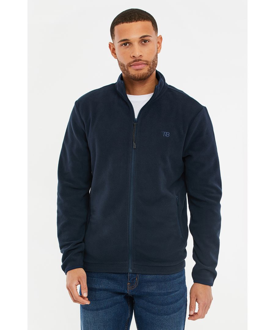 This fleece jacket from Threadbare Outdoor is designed in a microfleece fabric. It features a high neck, zip fastening lined pockets, adjustable bungee drawcord on the hem and has reflective detailing. Other styles available.