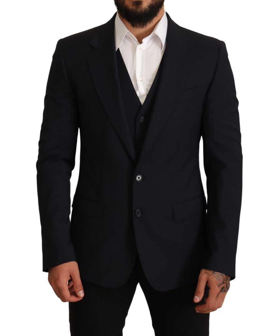 DOLCE & GABBANA\nAbsolutely stunning, 100% Authentic, brand new with tags MARTINI dark blue, 2 piece suit is crafted from a wool and features a jacket with a notch lapel, long sleeves, a chest pocket, side flap pockets and button cuffs.\nStyle: Single breasted 2 piece suit; includes blazer and vest\nColor: Dark Blue\nClosure: Two button closure\nFitting: Slim fit\nThree inside pockets\nOne open vent in the back\nVest has full button closure and an adjustable strap back\nLogo details\nMade in Italy\nVery exclusive and high craftsmanship\nMaterial: 55% Wool 41% Polyester 4% Elastane\nLining: 70% Rayon 30% Cupro